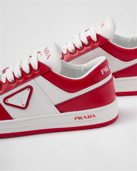 prada red and white sneakers.